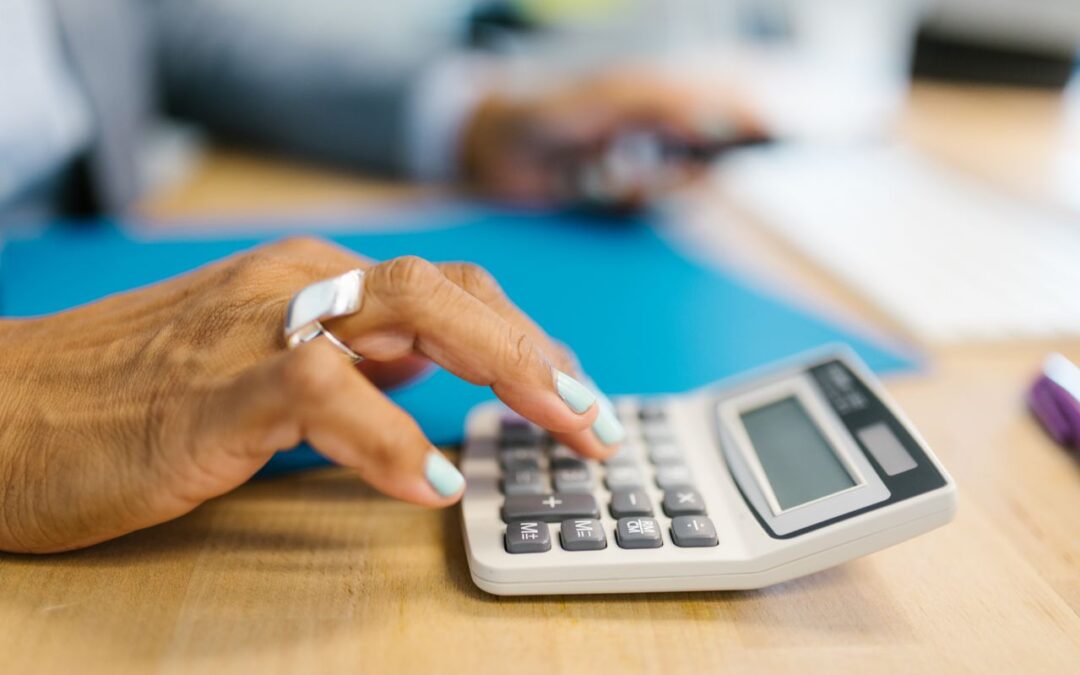 person with calculator