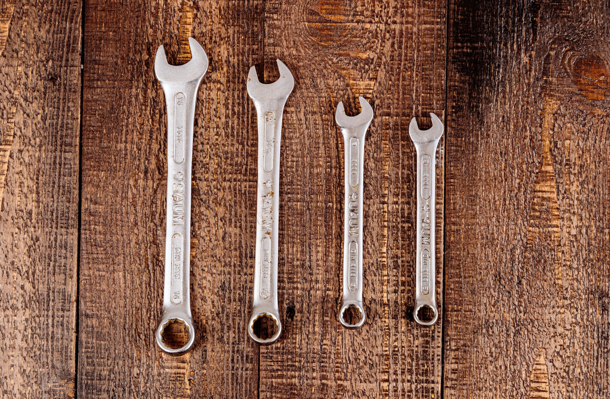 four wrenches in a line